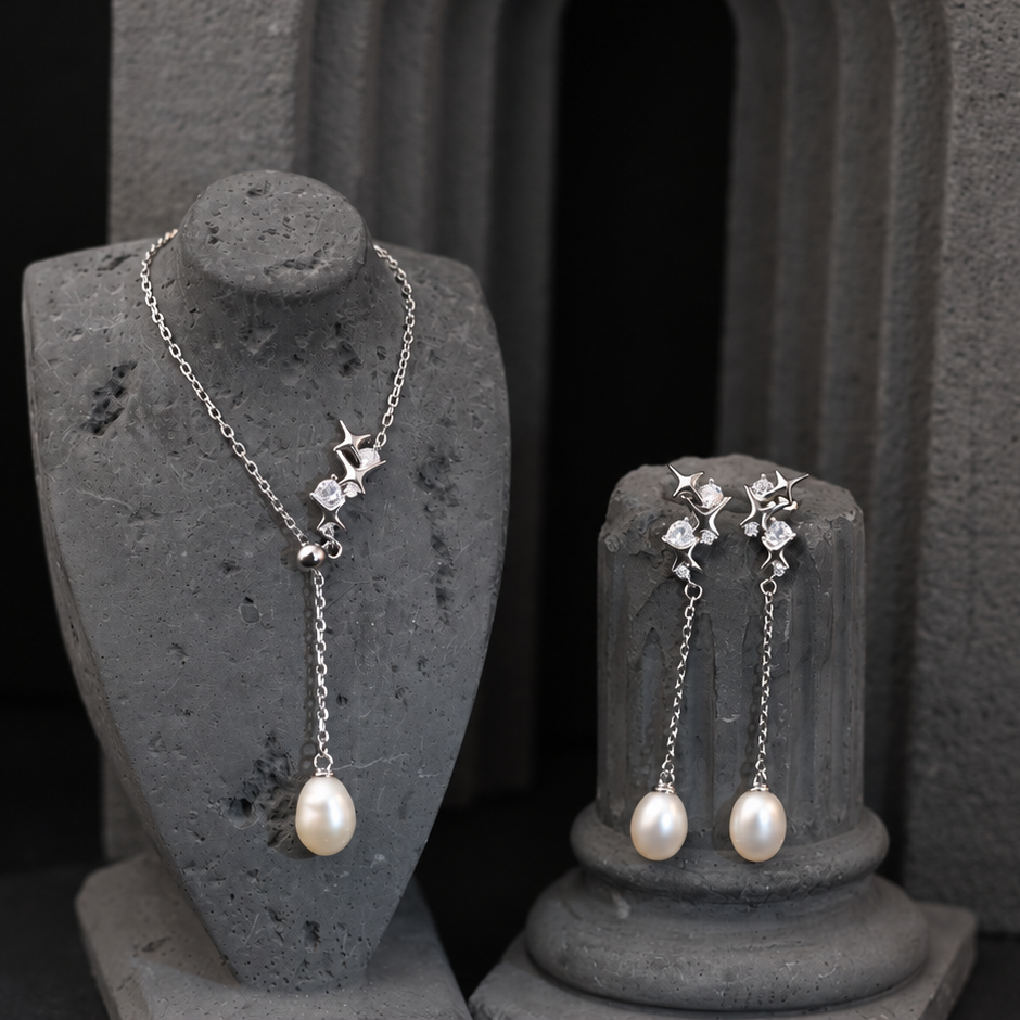 The Astraia Celestial Starburst / Radiant Oval Pearl Chain Drop Earrings